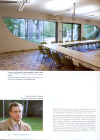 The main conference hall with softly curved window frame opens to the landscape of the sculpture park